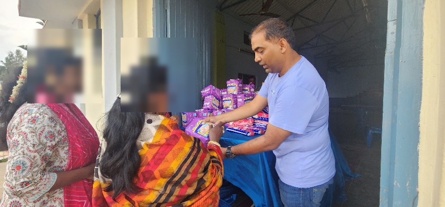Distributing sanitary products and diapers on Bannerghatta Road